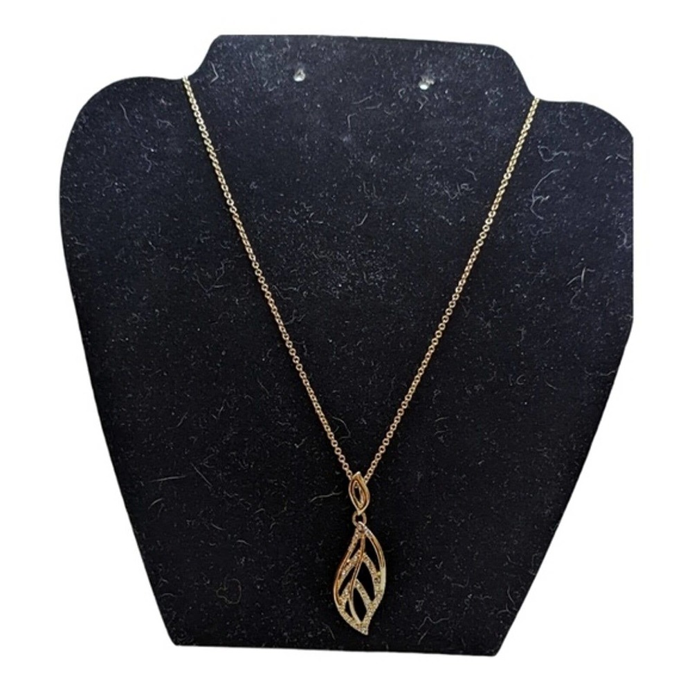 Gold leaf shaped necklace, bracelet and earrings.